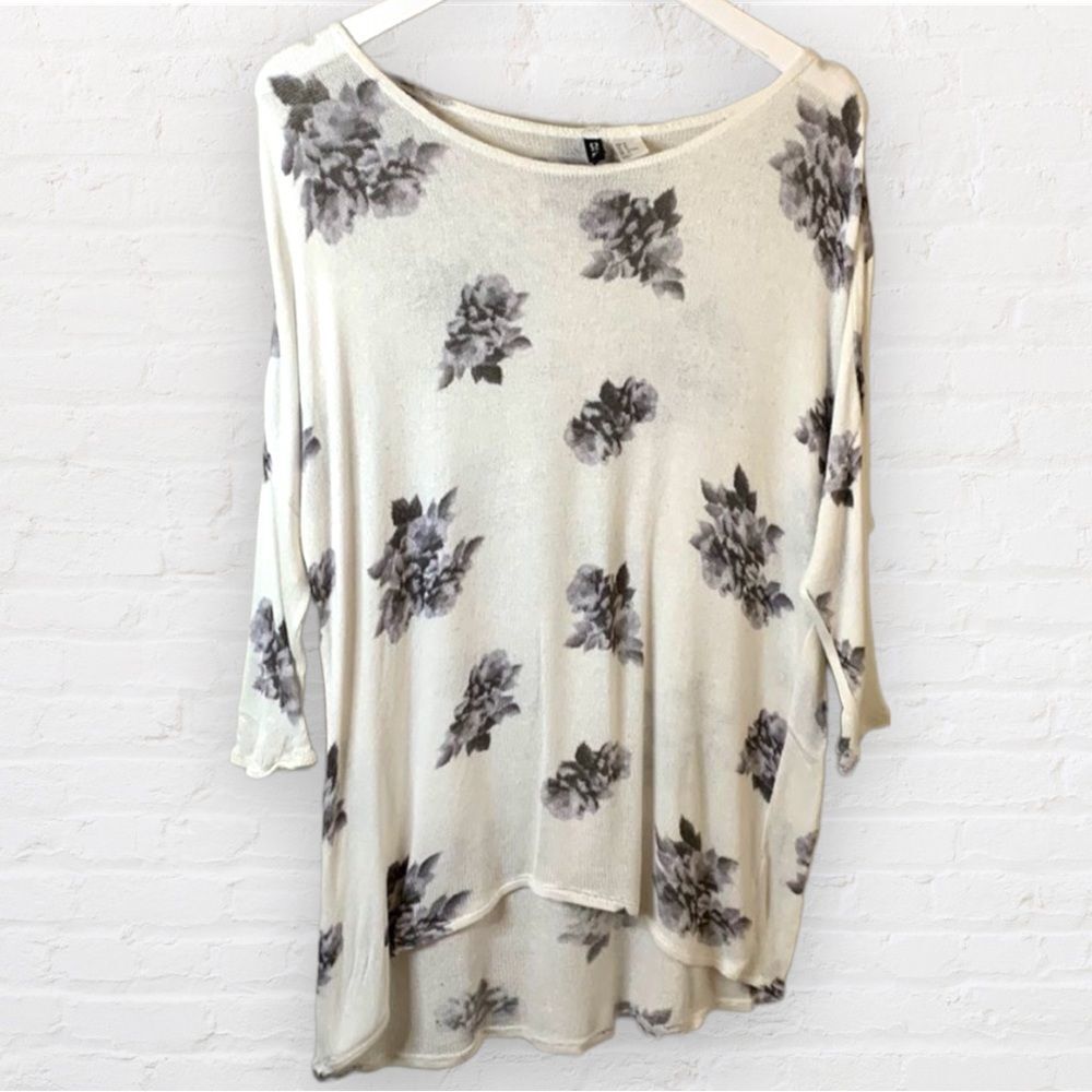 H&m sheer white blouse with black floral design above the elbow sleeves